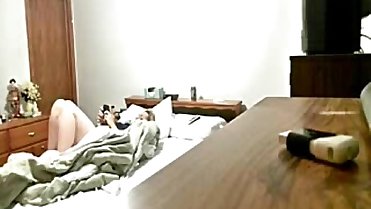 Hidden cam caught my mum on bed masturbating