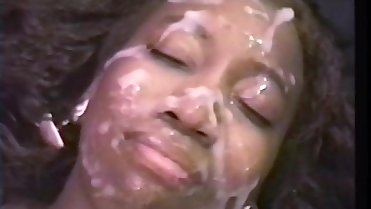 Black MILF covered in cum